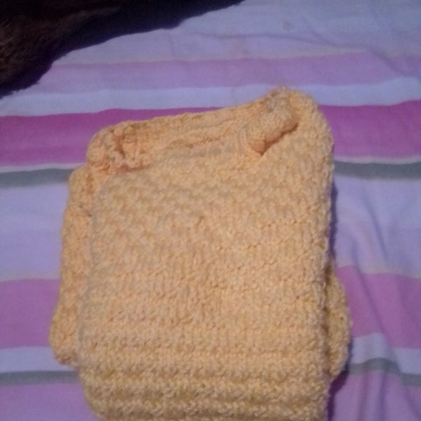 Pullover jaune pour enfant.