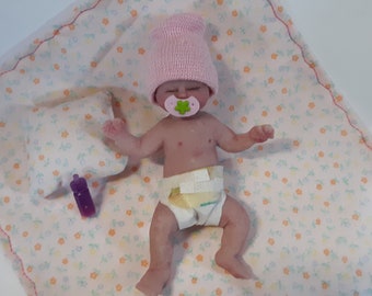 womb baby doll