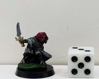 Male halfling rogue standing in a dungeons and dragons fantasy art Male halfling rogue standing in a dungeons and dragons fantasy art