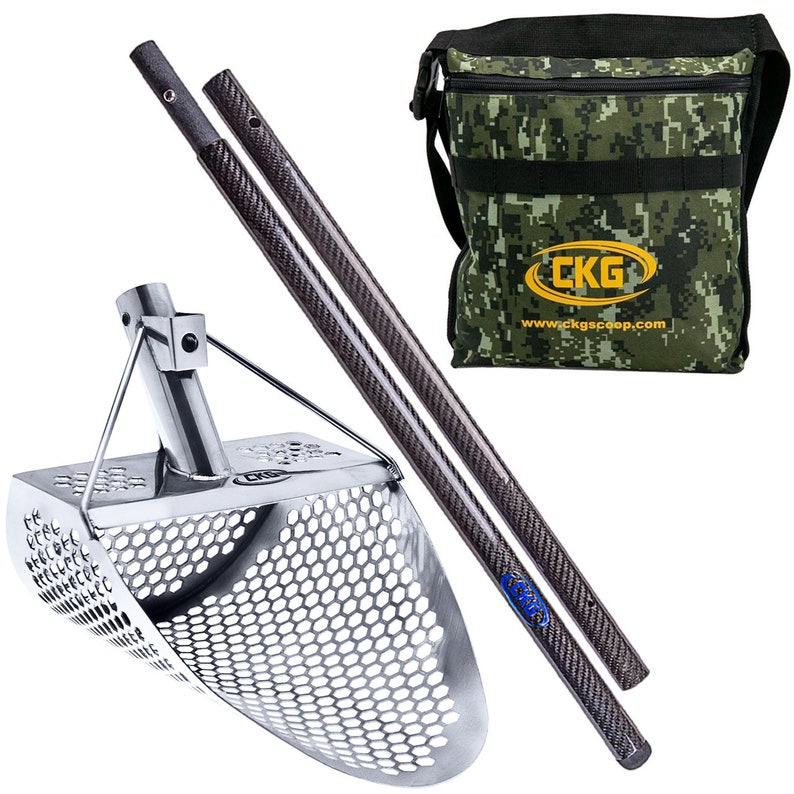 May include: A silver metal gold panning scoop with a black carbon fiber handle and a green camouflage carrying bag. The bag has the text "CKG" and "www.ckgscoop.com" printed on it.