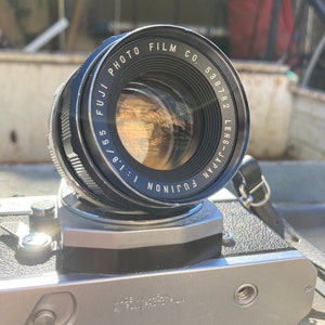 Fujica ST701 with Fujinon 55mm f/1.8 M42 Mount Lens image 8