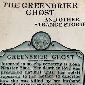 May include: A vintage book cover with the title "The Greenbrier Ghost and Other Strange Stories". The cover features a black and white image of a sign with the text "Greenbrier Ghost" and a description of a local ghost story.