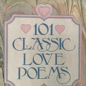 May include: A vintage book cover with a marbled background. The title is "101 Classic Love Poems" with pink hearts on either side of the number 101.