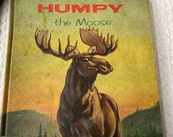 1963/PRIMERA EDICIÓN/ Explora la vida de un alce/ Atractivo y bellamente ilustrado/ Humpy el alce/Harry Baerg/ Excelente libro para leer en voz alta