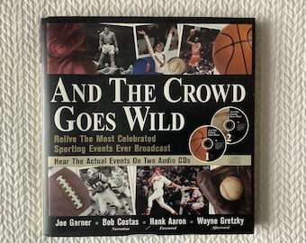 1999 / Y la multitud se vuelve loca / Reviva los eventos más célebres / Grandes momentos del deporte / Hank Aaron-Ali-Gehrig / Audio CD Plus 179 págs. Tapa dura grande