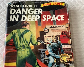 1953/ #2 Tom Corbett series/ Tom outwits Space Bandits then rescues his companions/209 page Hardcover/Carey Rockwell/ Danger in Deep Space