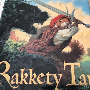 May include: Book cover illustration of a squirrel in a red hat and vest wielding a sword. The title "Rakkety Tam" is in gold lettering. The background features a dark silhouette and a castle.