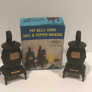 Pot Belly Stove Salt and Pepper Plastic Shakers by Art Mark Made in Hong Kong New.VINTAGE UNIQUE RARE