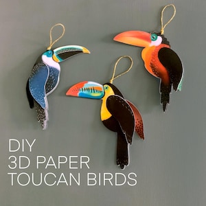 May include: A set of three ceramic mugs with a speckled, matte finish. The mugs are in shades of cream, light gray, and dark gray. Each mug has a simple, minimalist design, perfect for coffee or tea.