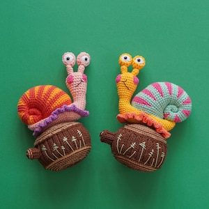 Cute amigurumi crochet snail from the Cutie Crawlies pattern bundle, perfect as a handmade gift or decor