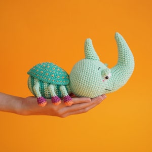 Detailed crochet pattern of a Hercules beetle from the 11-character Cutie Crawlies amigurumi bundle by Aquariwool.