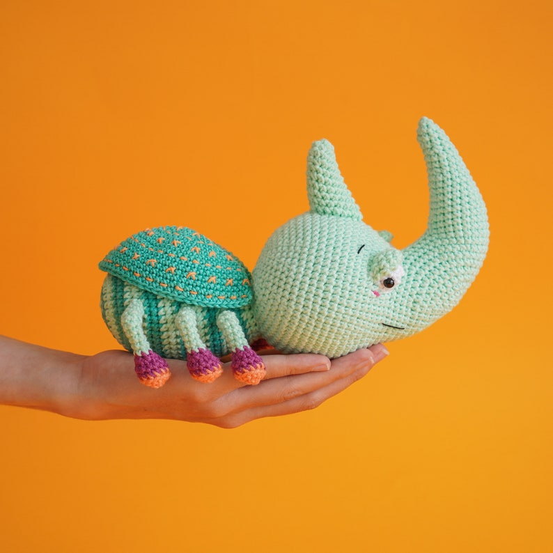 Detailed crochet pattern of a Hercules beetle from the 11-character Cutie Crawlies amigurumi bundle by Aquariwool.