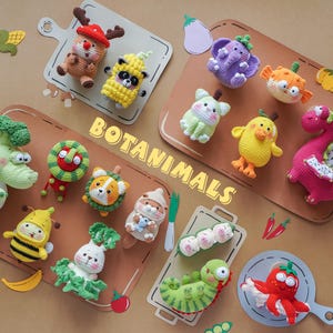 May include: A collection of colorful, crocheted "Botananimals" arranged on wooden cutting boards. The collection includes a variety of animal-vegetable hybrids, such as a broccoli dinosaur, a bee in a banana costume, and a tomato octopus. The word "Botananimals" is displayed.