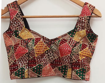 multi color pretty heavy embroidered work and sequins work saree blouse . ready made fashionable designer blouse / crop top .(base : black)
