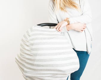 multi-use capsule and breastfeeding cover