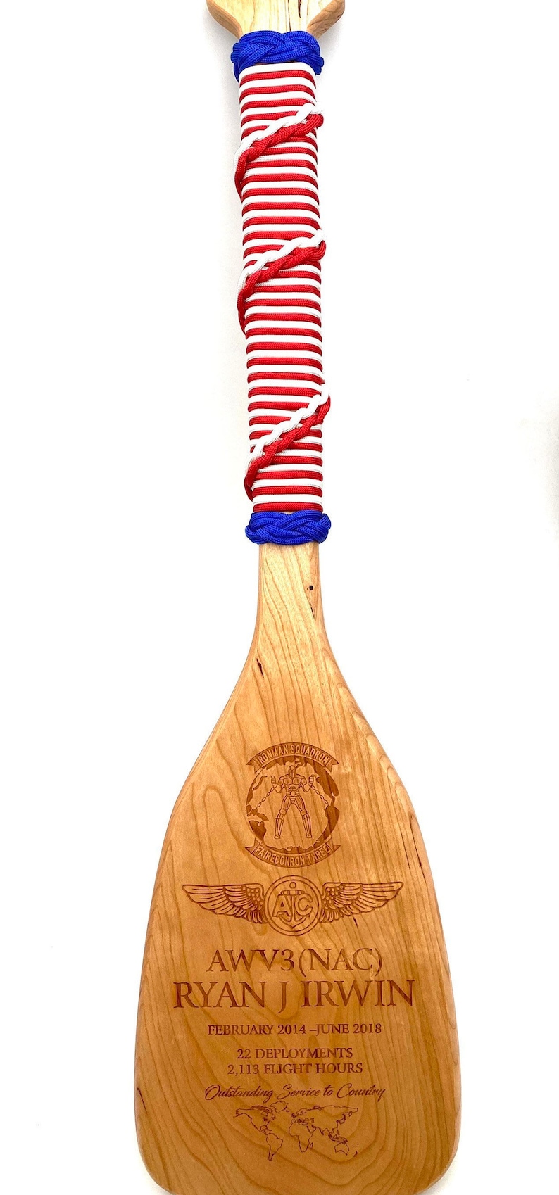 Military paddle made of top grade cherry wood with custom laser engraving.  Navy, USCG, Marines, Air Force, Army, Joint Chiefs, any logo you would like.  Price includes all front side engraving and paracord wrap plus free shipping.