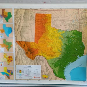 May include: A large wall-mounted pull-down map of Texas titled Texas The Lone Star State by Nystrom. The map features a central topographic relief map with color-coded elevation zones, surrounded by five smaller inset maps showing regional data.