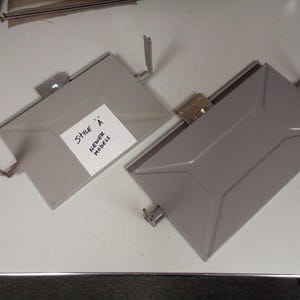 May include: Two gray metal drawer slides with a label that reads "Style 'A' Newer Models".