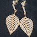 see more listings in the Chain crystal earrings  section