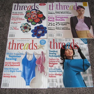 May include: Four issues of Threads magazine, a sewing publication. The covers feature various sewing projects, including a floral design, a black dress, a swimsuit, and a blue coat.