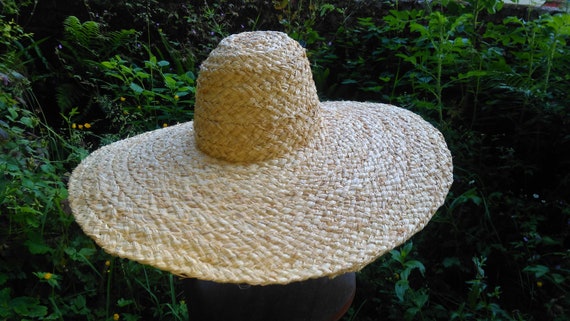 Ladies Summer Hat with Large Brim made from plaited Raffia.