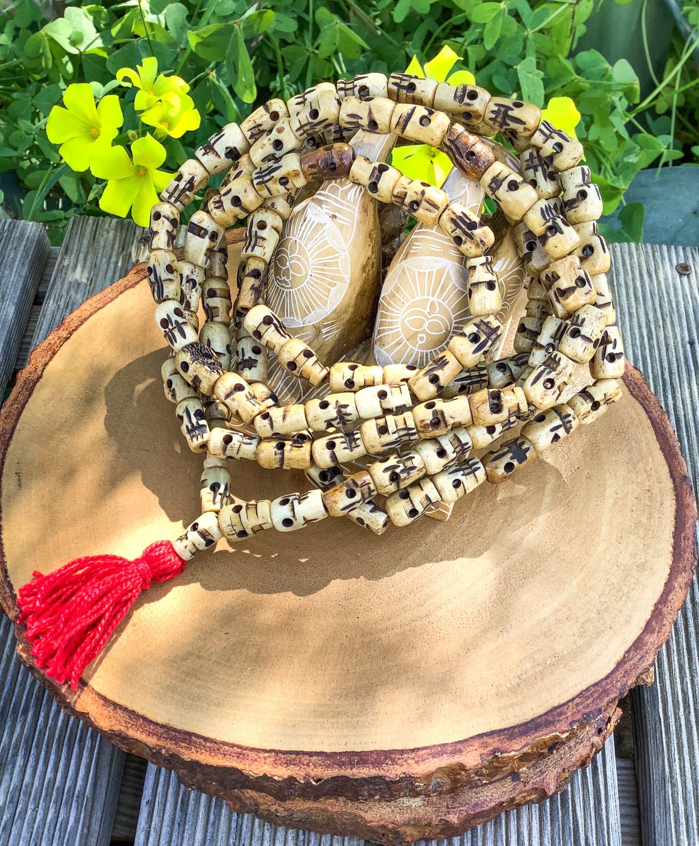 Hand carved bone skull beads – Kruger EDC