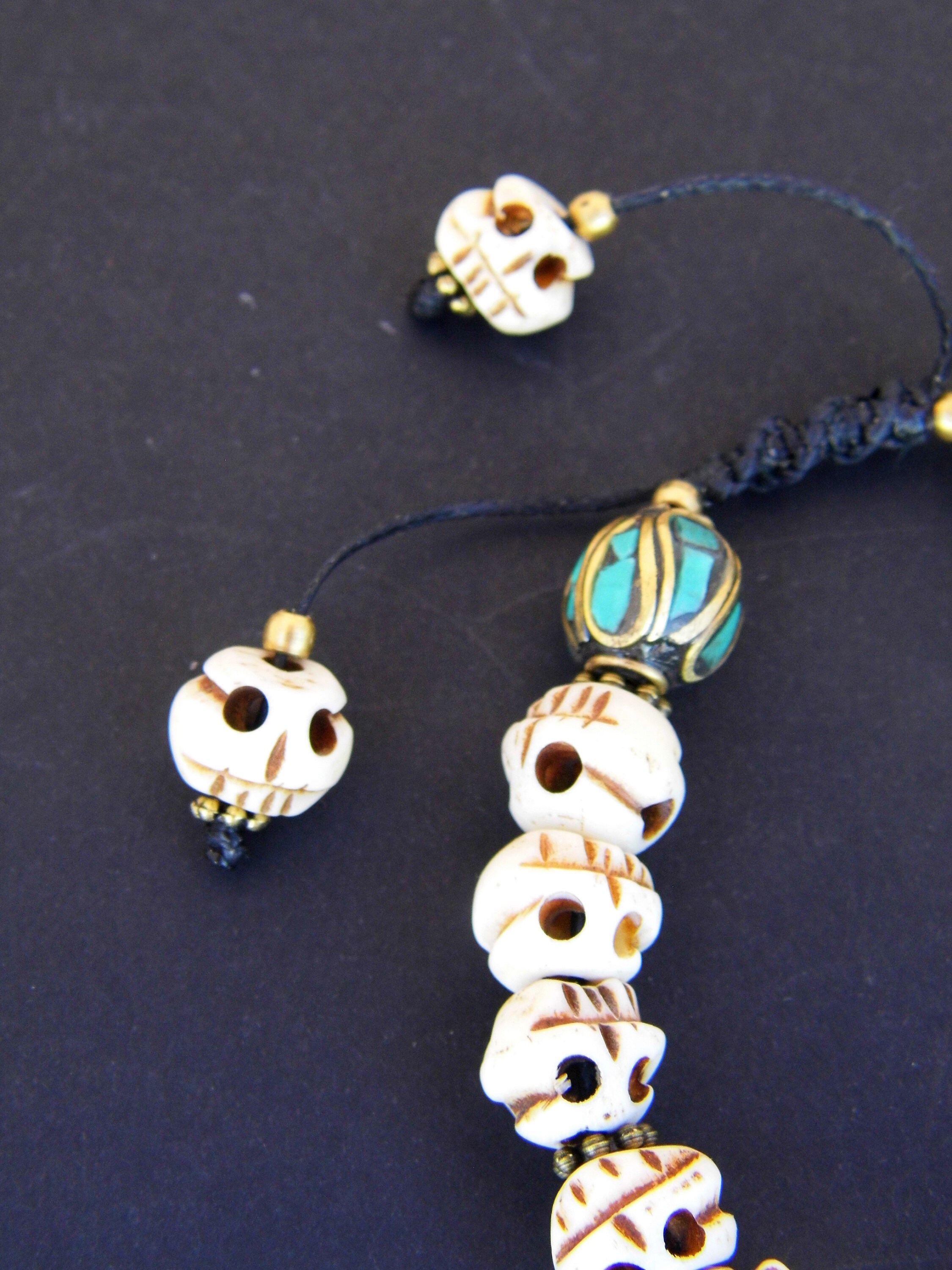 Hand Carved Yak Bone Skull Bracelet - Tibetan Turquoise Inlaid