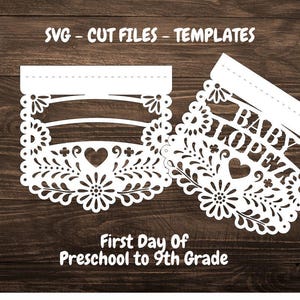 May include: Two white paper cut-out banners with a floral design. The top banner has a blank space for text. The bottom banner says "BABY LOVE" in a script font. The text "First Day Of Preschool to 9th Grade" is below the banners.
