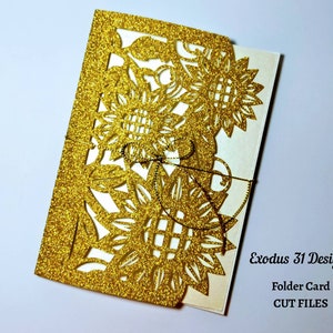 May include: Gold glitter folder card with a cut-out design of sunflowers. The card is folded in half and has a white interior. The text "Exodus 31 Designs" and "Folder Card CUT FILES" is printed on the front of the card.