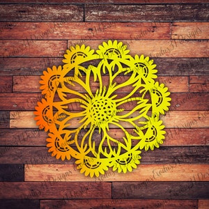 Puede incluir: Un dise&ntilde;o de mandala amarillo y naranja con un patr&oacute;n de girasol. El dise&ntilde;o es intrincado y detallado, con una forma circular y un patr&oacute;n repetitivo de girasoles.