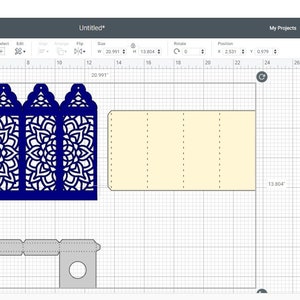 May include: A Cricut Design Space screen showing a design for a Moroccan lantern. The design is made up of three blue panels with intricate cut-out patterns and a beige panel with score lines. The design is 20.597 inches wide and 13.804 inches tall.
