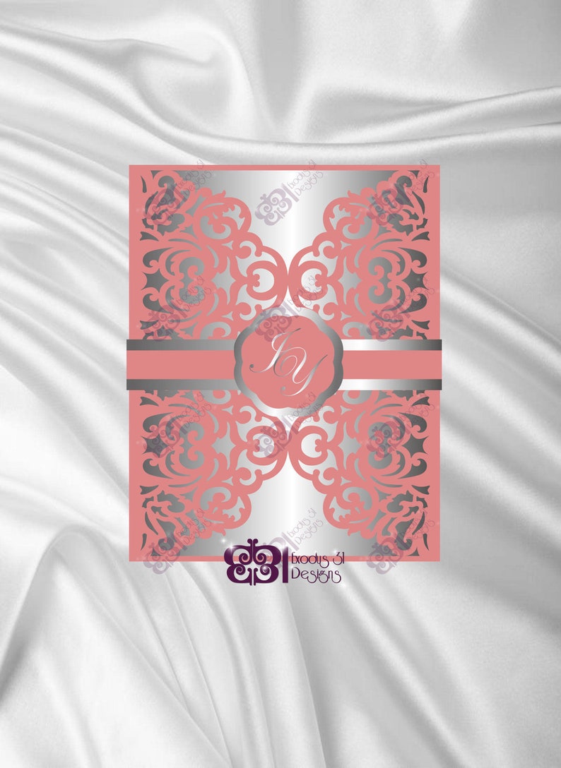 May include: A laser cut wedding invitation with a delicate floral design in silver on a coral background. The invitation features a monogram in a circle with the initials "JY".