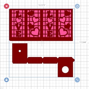 May include: A red cardstock cutout of the word "LOVE" with pink hearts. The cardstock is cut into a design that resembles a window pane. The cardstock is folded to create a 3D effect.
