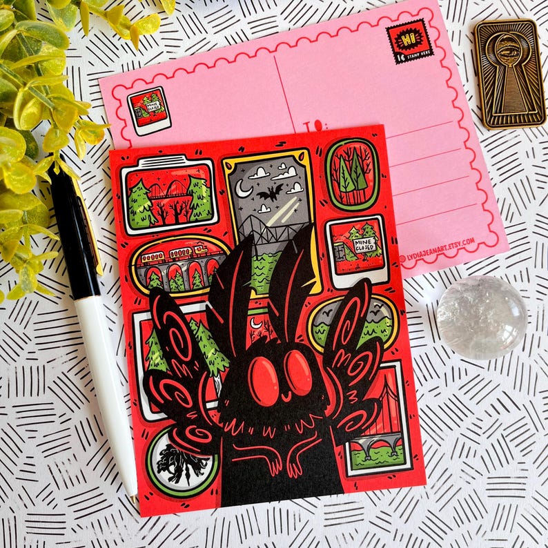 May include: A red and black postcard featuring a cartoon moth with large eyes and wings. The postcard is decorated with images of a forest, a bridge, and a sign that says "Mine Closed".