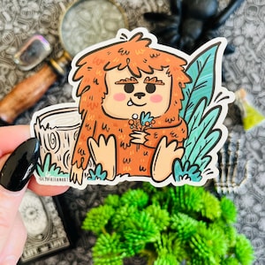 Bigfoot in the Flowers Vinyl Sticker | Cryptids | Cute Cryptid  | Cryptozoology | Cute Bigfoot | Sasquatch Sticker | Bigfoot Sticker