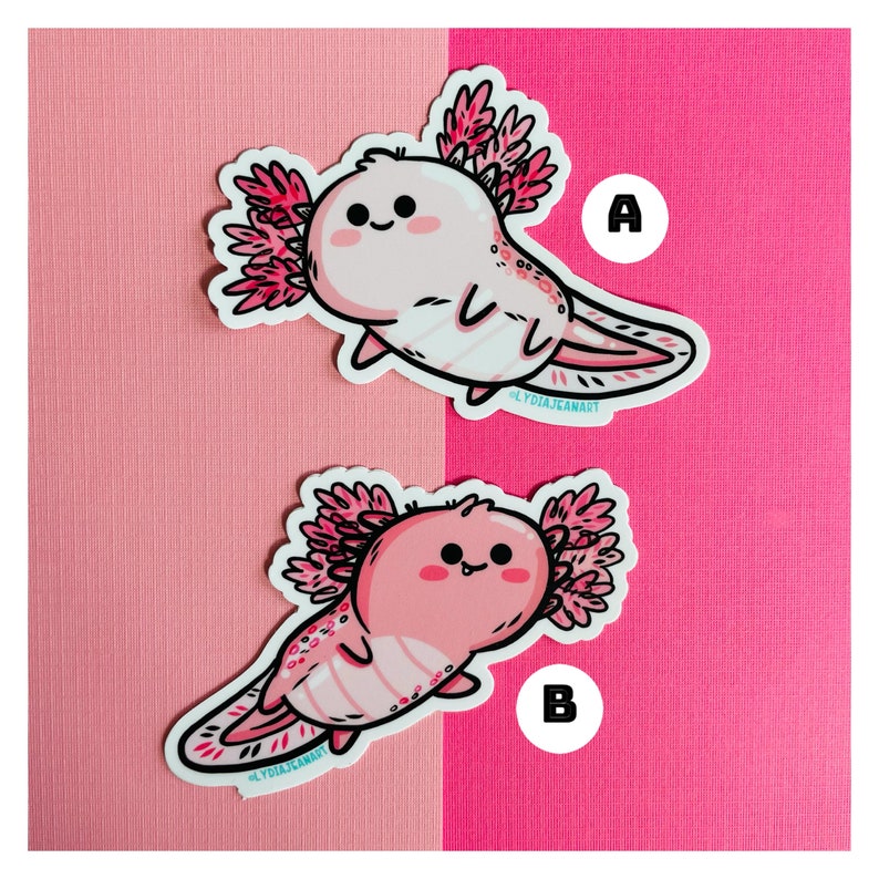 Puede incluir: Dos pegatinas de axolotl rosas con un contorno blanco y detalles rosas y blancos. Los axolotls sonr&iacute;en con la boca cerrada y tienen ojos peque&ntilde;os y negros. Las pegatinas est&aacute;n sobre un fondo rosa. Las pegatinas est&aacute;n etiquetadas con A y B.