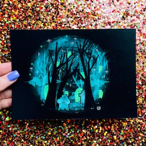 May include: A black and white illustration of a spooky forest with a glowing green moon and ghosts. The trees are silhouetted against the moon and the ghosts are floating in the air. The illustration is done in a whimsical style.