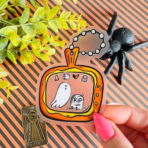 Ghostgotchi Halloween Sticker: Matte Vinyl Laptop Decal