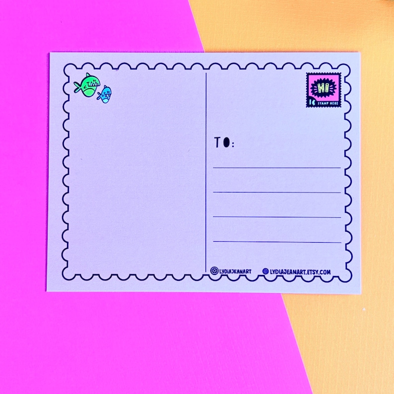 May include: A light purple postcard with a scalloped border and a stamp that says "HI". The postcard has lines for the recipient's address and the text "TO:". The postcard also has two small fish illustrations.