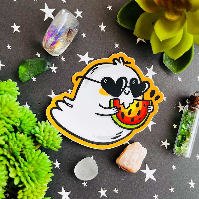May include: A white ghost wearing sunglasses and eating a slice of watermelon. The ghost has a happy expression and is holding the watermelon with its hands. The background is a black and white pattern.