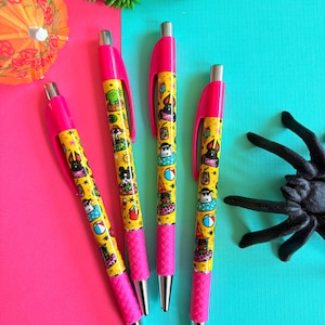 May include: Four retractable pens with bright pink clips and textured grips. The barrels are yellow and feature a repeating pattern of small cartoon characters in pool floats, beach balls, ice cream cones, and suns, with silver metal tips.