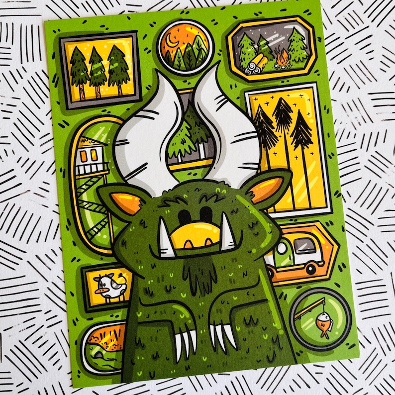 May include: A green monster with large teeth and horns is surrounded by small framed pictures. The pictures depict scenes of nature, including trees, a cabin, and a campfire.