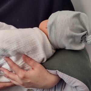 muslin nursie arm rest muff for on the go nursing, portable and compact design forearm slip on nursing pillow