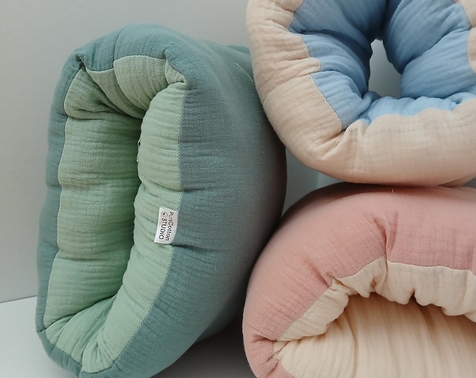 organic mini nursing pillow for on the go, all natural arm slip on cushion for baby feeding, compact travel pillow for breastfeeding support