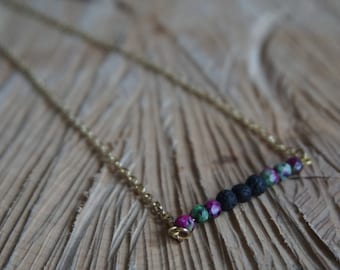 Essential Oil Diffusing Necklace with Ruby in Zoisite and Black Lava Beads