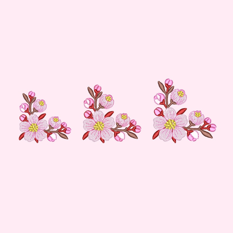 May include: Three embroidered pink and white flower clusters with red stems and green leaves. The flowers are arranged in a corner design.