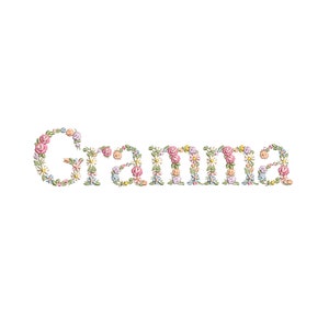 May include: The word "Gramma" spelled out in colorful flowers. The flowers are pink, purple, yellow, and white.