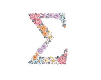 Può includere: Una lettera Z floreale realizzata con fiori rosa, arancioni, blu e bianchi. La lettera è realizzata con fiori ricamati.