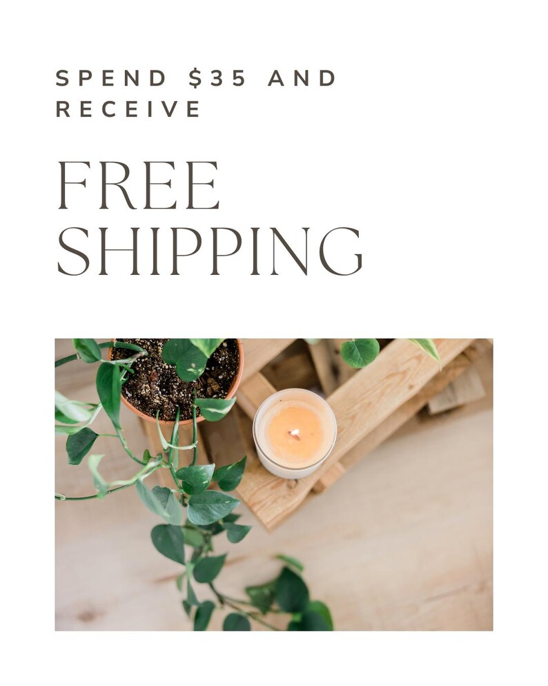 May include: A lit candle in a white container sits on a wooden crate next to a potted plant with green leaves. The image also includes the text "SPEND $35 AND RECEIVE FREE SHIPPING."