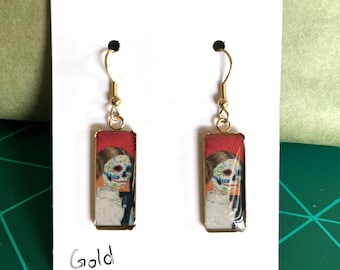 Gold earrings: original art in clear resin, 18k gold plated hooks, stainless steel pendants, day of the dead, cowboy skull, made to order